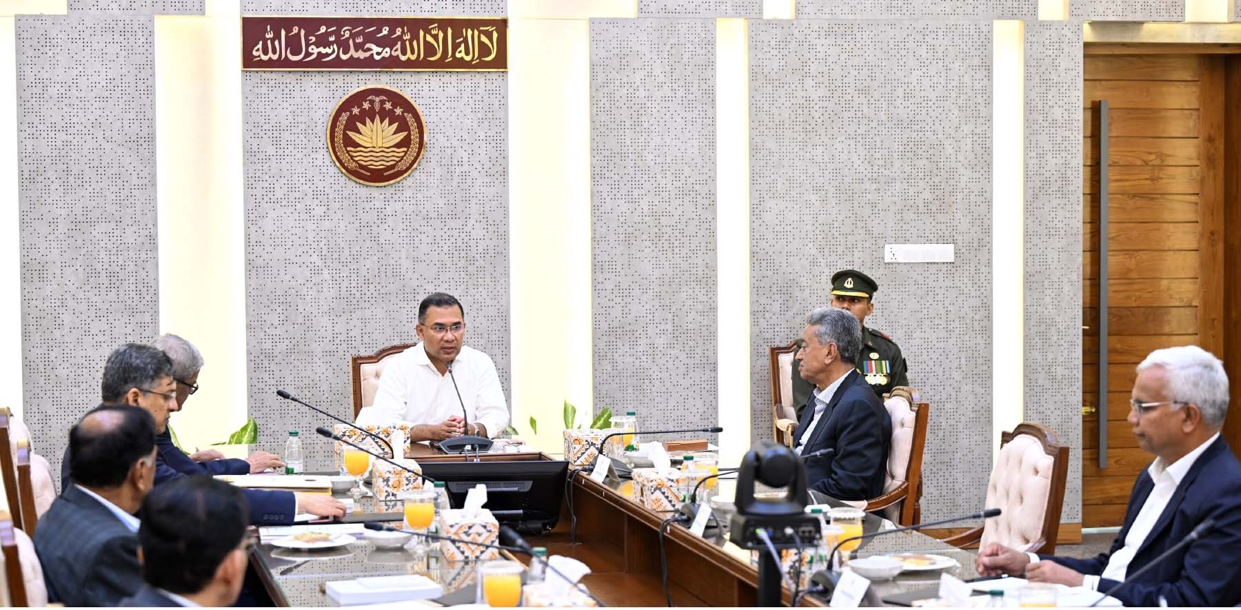 The image shows Bangladesh Prime Minister Tarique Rahman at a cabinet meeting.